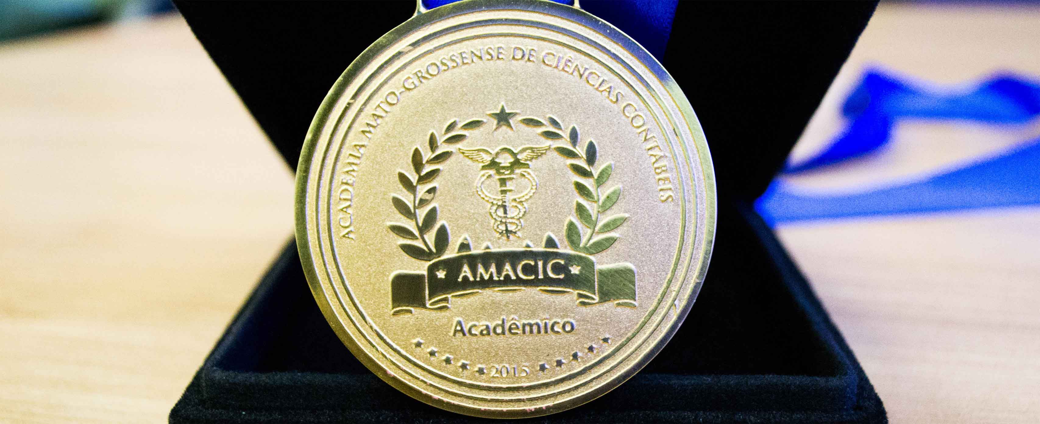 A LOGOMARCA DA ACADEMIA MATO-GROSSENSE DE CIÊNCIAS CONTÁBEIS
